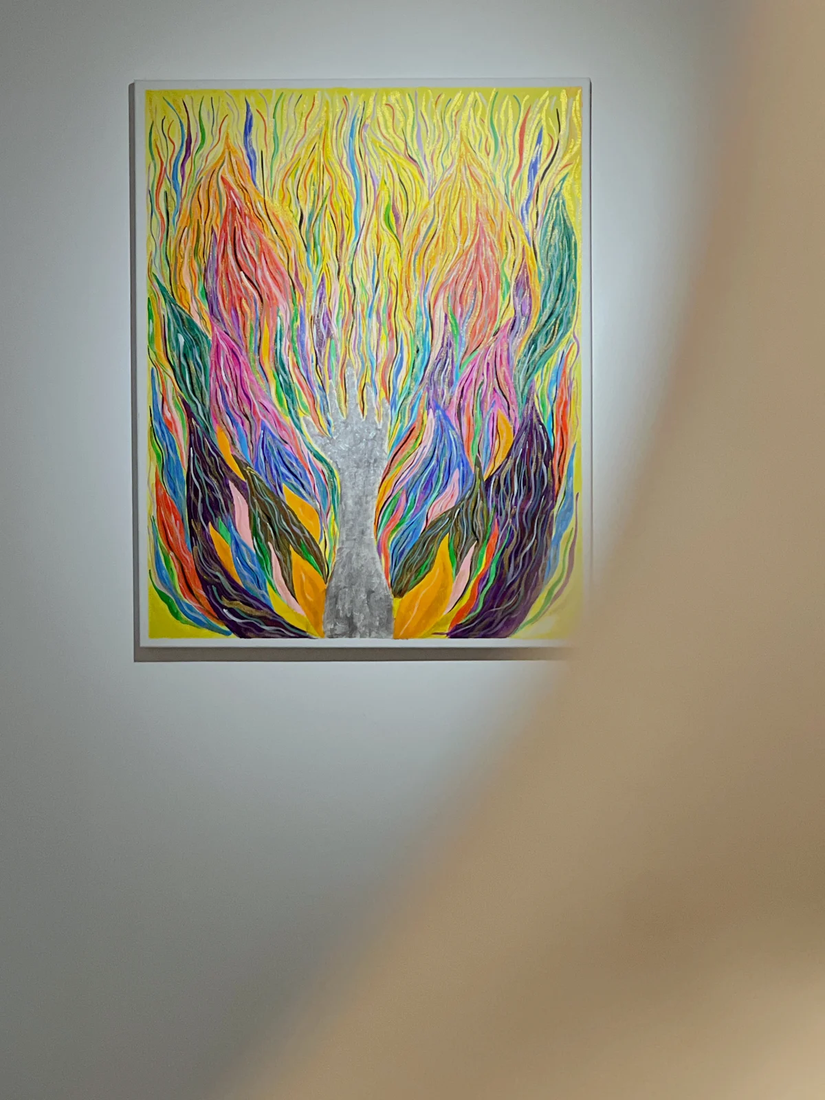 Bright yellow, purple and green painting at Du Haha’s Grace exhibition